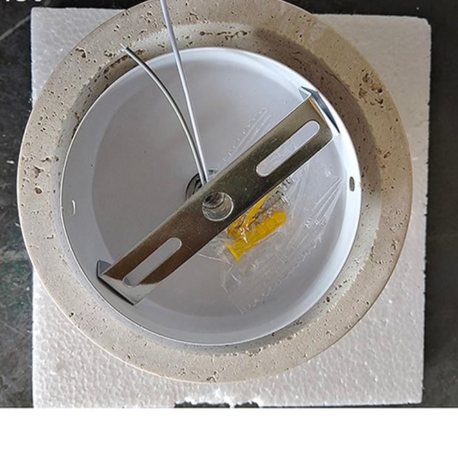 Garduru Creme Wandlampe – Minimalistische Eleganz mit einem sanften Glühen