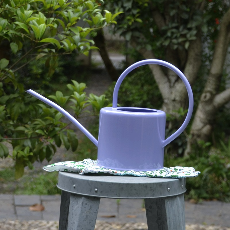 Stylish metal watering can for plant care and watering
