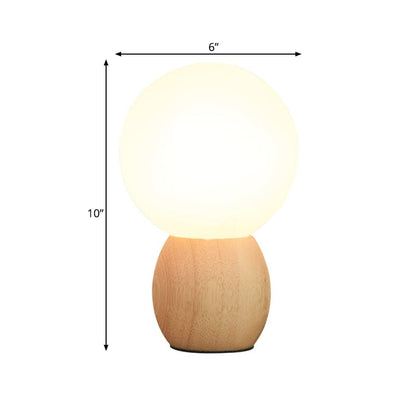 Elegante Nachttischlampe mit Holzfuß und Glasschirm | GlowLuxury
