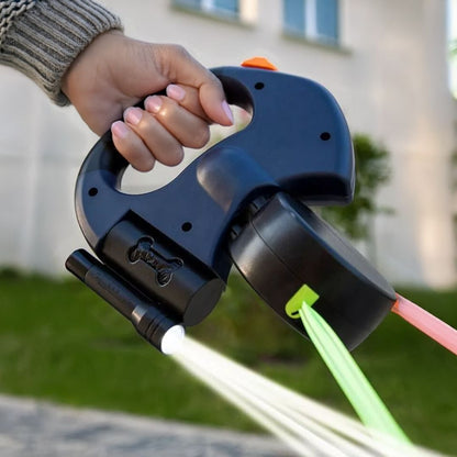 Duale rückziehbare Hundeleine mit Taschenlampe und Abfallbeutelhalter