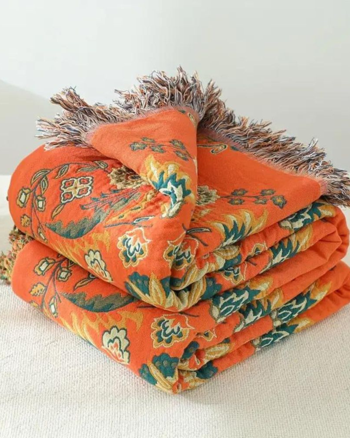Soleil – Luxuriöse Baumwolldecke mit warmem Ringelblumenfarbton und Boho-Charme
