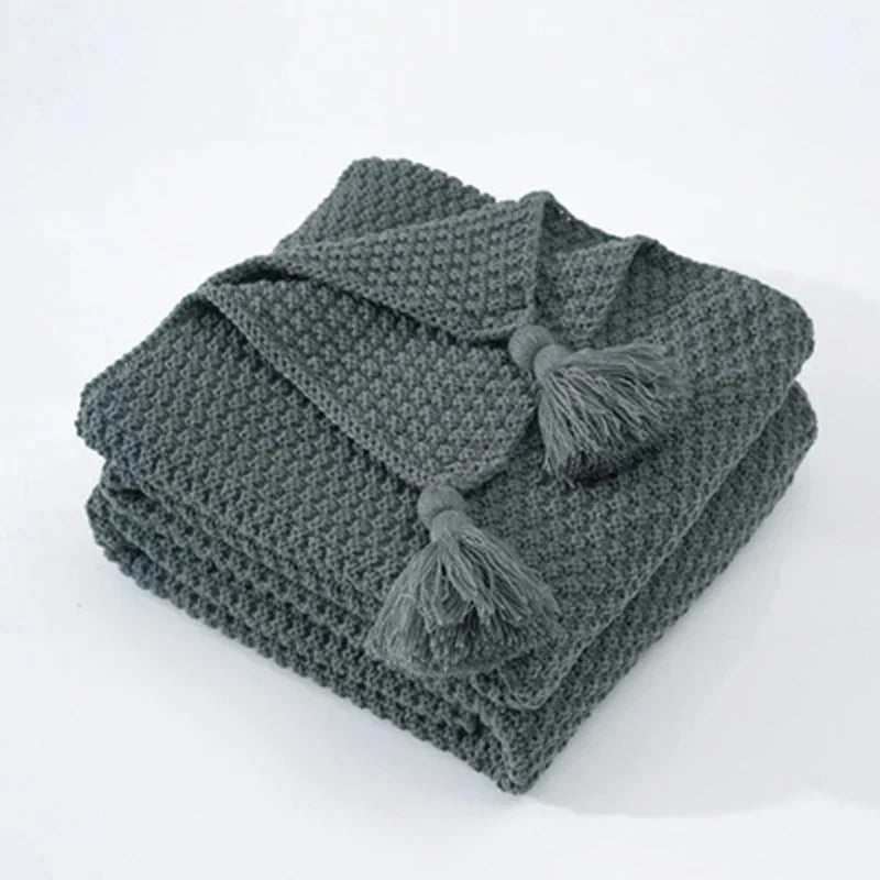 Gemütliche gestrickte Quasten-Wolldecke