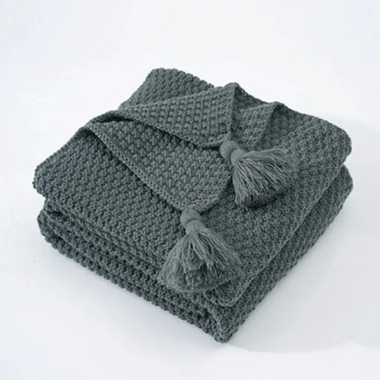 Gemütliche gestrickte Quasten-Wolldecke
