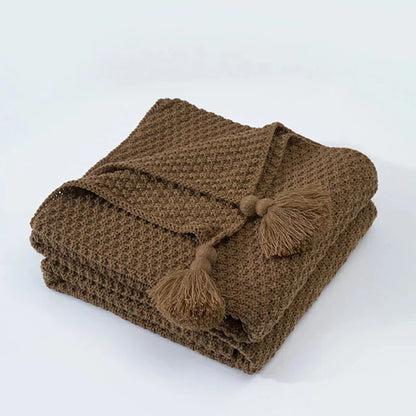 Gemütliche gestrickte Quasten-Wolldecke