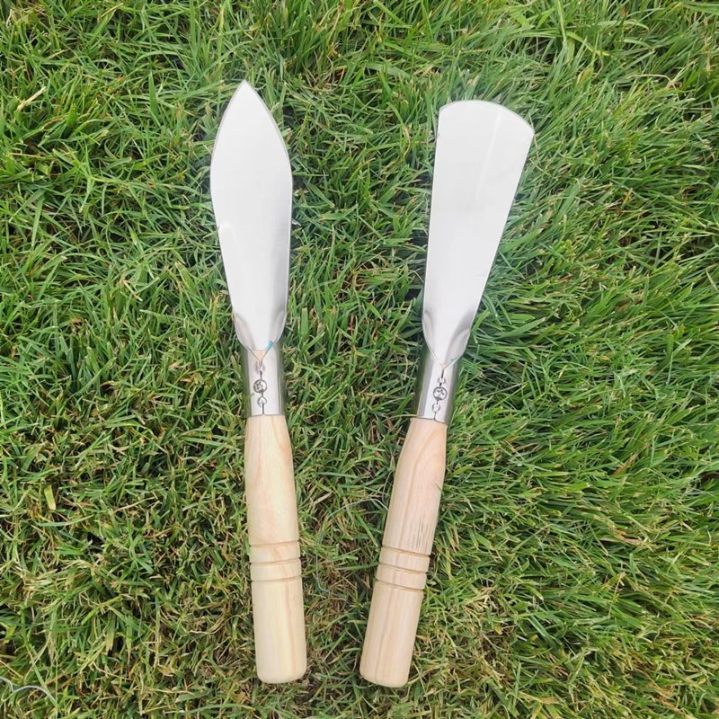 Edelstahl-Unkrautstecher mit Holzgriffen für den Gartenbau