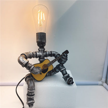 Garduru Gitarrenspieler Retro Tischlampe Glow Ambiente