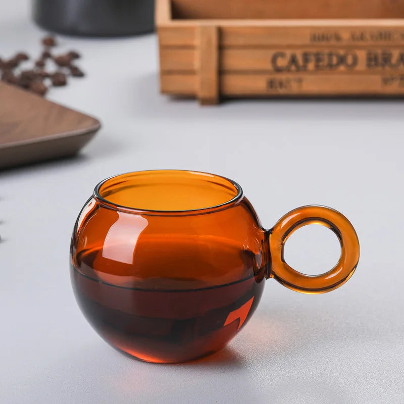 OrbitRing - Glas-Tasse mit einzigartigem Ringgriff