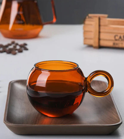 OrbitRing - Glas-Tasse mit einzigartigem Ringgriff