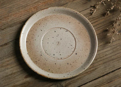 RusticCharm - Keramiktasse mit Untertasse im handbemalten Design