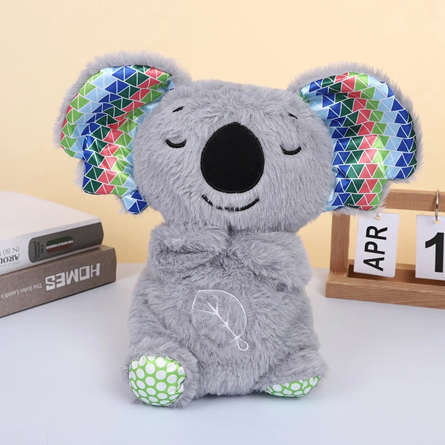 Garduru - Schlafende Koala-Plüschfigur mit beruhigendem Atemlicht und Musik