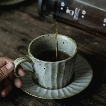 TerraCharm - Kaffeetasse mit Untertasse im handgefertigten Design