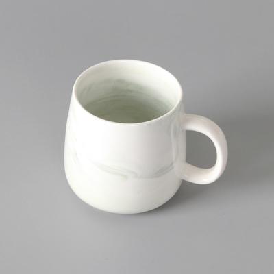 Künstlerische kreative Kaffeetasse