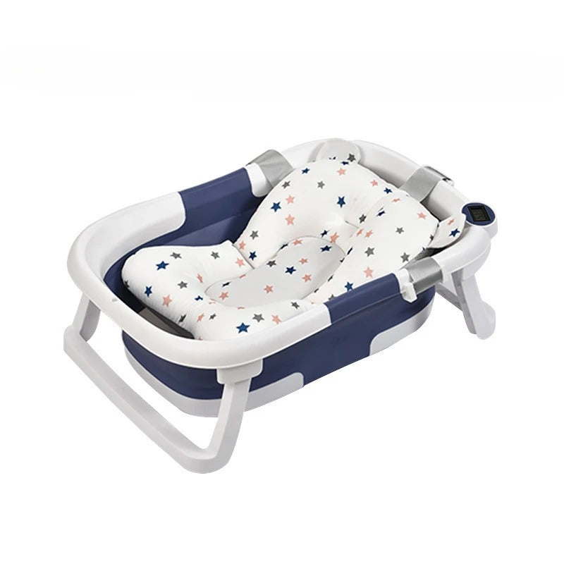 Faltbare Babybadewanne mit rutschfestem Kissen und integriertem Thermometer.