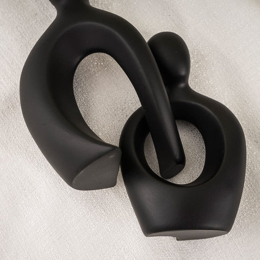 Überlappende Paar abstrakte Skulptur