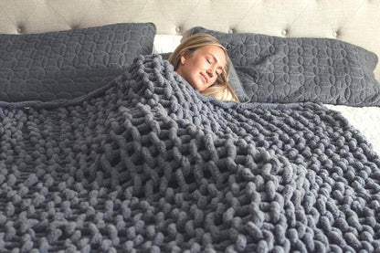 Weiche und warme Strickdecke - CozyWeave™