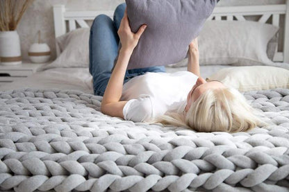 Weiche und warme Strickdecke - CozyWeave™