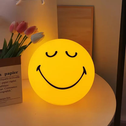 Garduru - Tragbare Smiley Lampe aus weichem Silikon mit warmer LED-Beleuchtung