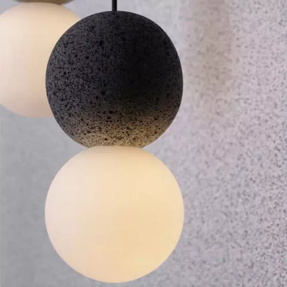 Suspension Origo – Geometrisches Design aus Vulkanstein und Opalglas-Diffusor