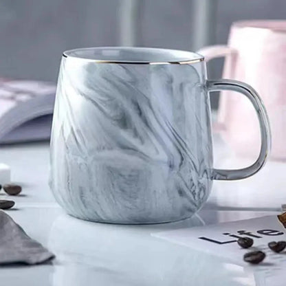 Kaffeetasse aus Keramik in Pastellfarbe mit Marmormuster