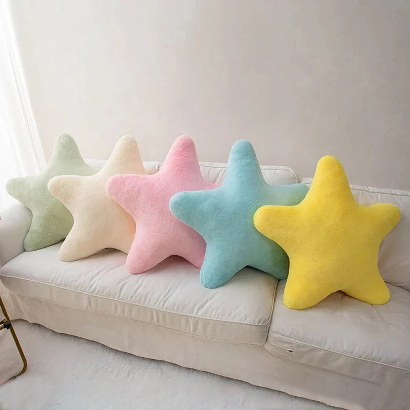 Pastellfarbiges sternförmiges Kissen