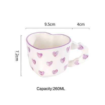 Musterte Kaffeetasse mit passender Untertasse