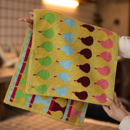 Weiches Kinderhandtuch aus Baumwolle mit Birnen-Motiv