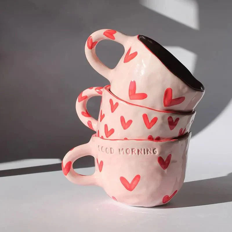 Kaffeetasse aus Keramik mit rosa Herz