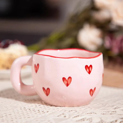 Kaffeetasse aus Keramik mit rosa Herz