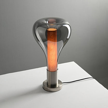 Elegante Tischlampe mit Holzfuß und Glaskuppel