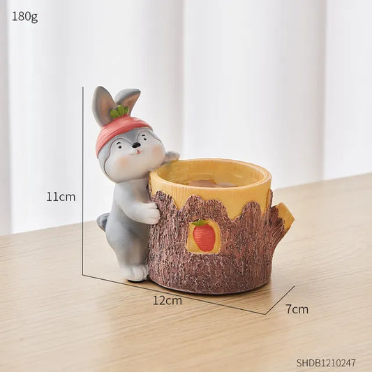 Blumentopf mit Cartoon-Tieren